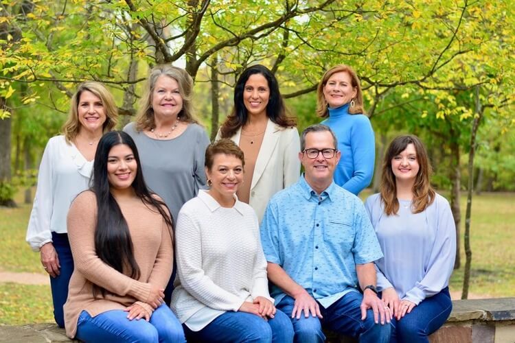 Team photo of a dental team in Plano, TX